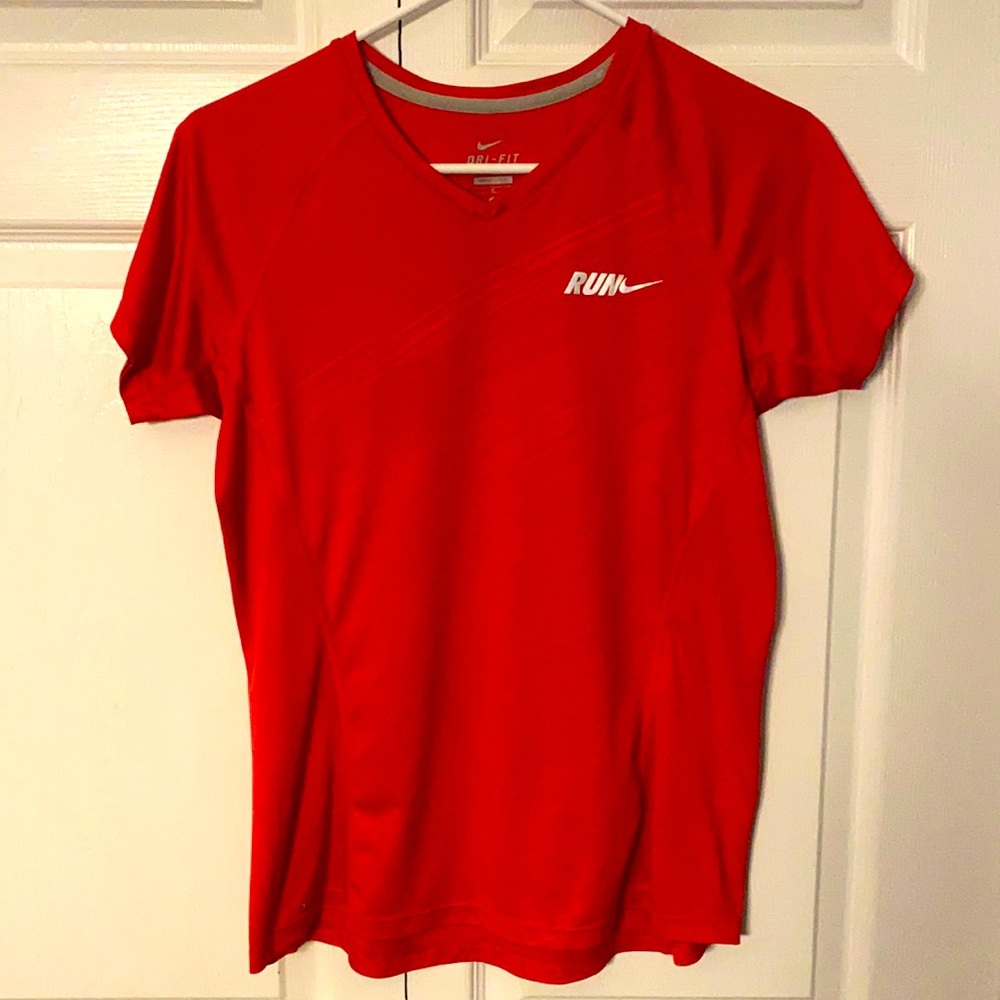 Women’s size medium Nike Dri-Fit running shirt!